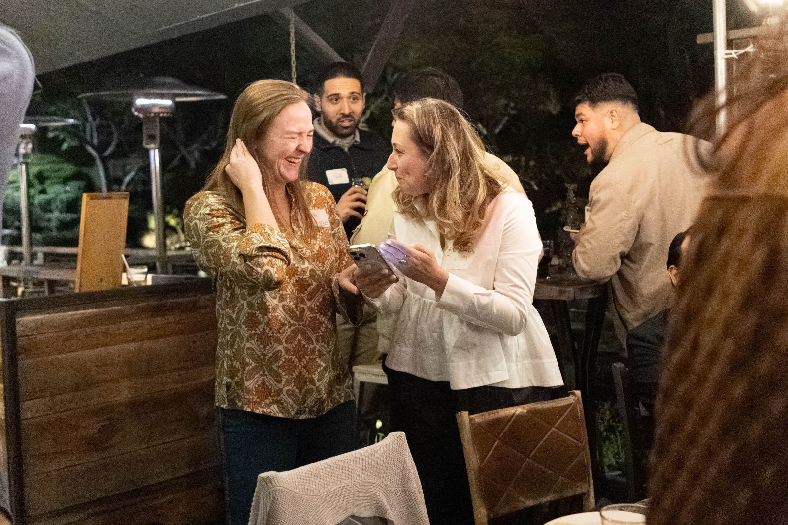 Two colleagues having a laugh.